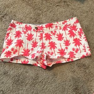 Red camel palm tree shorts